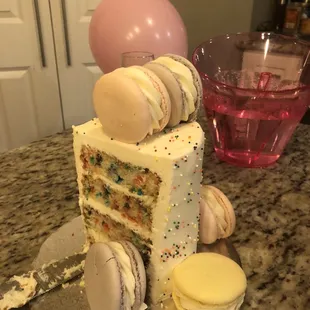 Funfetti cake with macaroons.  Cake $50 and 6 macaron package was $15