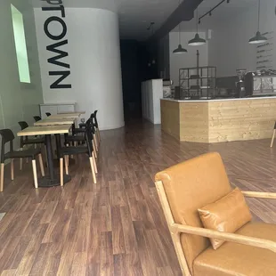 a coffee shop with a wooden floor