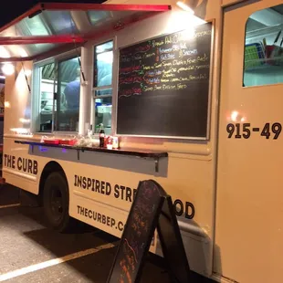a food truck parked in a parking lot