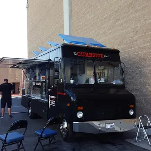 a food truck parked in a parking lot