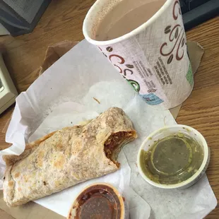 Chorizo, Egg y Papas burrito, homemade salsa, champurrado.your palette will thank you for a mouth full of different flavor&apos;s!!