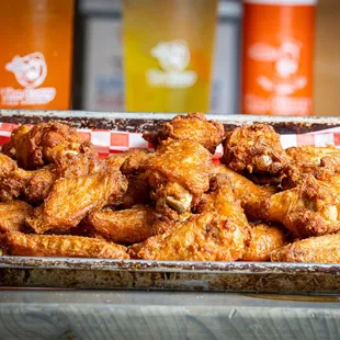 a tray of chicken wings