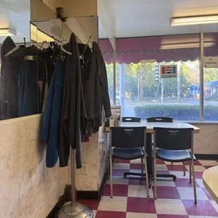 Checkerboard linoleum &amp; a coat rack, I&apos;m guessing from waaay back