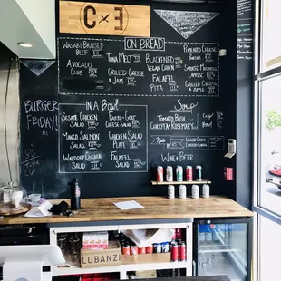 a blackboard menu on the wall