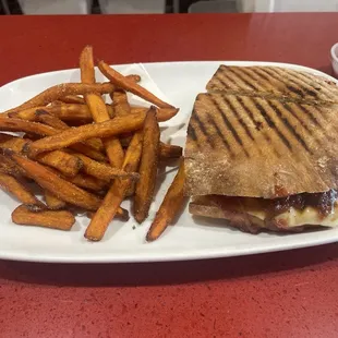 Grilled cheese and jam, with bacon added and sweet potato fries on the side