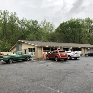 a parking lot with cars parked in it