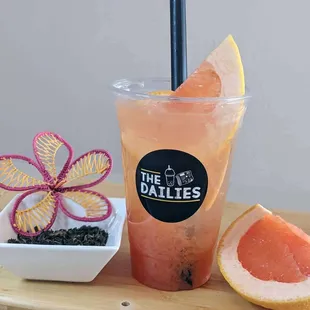 a grapefruit and a grapefruit drink