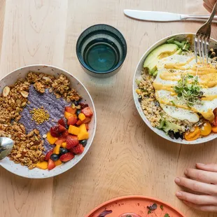 two bowls of food on a table