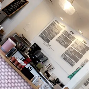 a man standing in a coffee shop