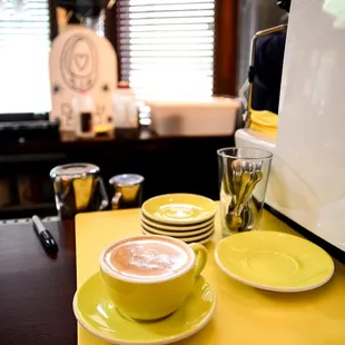 two cups of coffee on a table