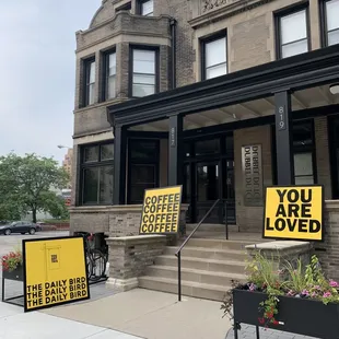 a building with a sign that says you are loved