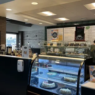 a counter with a variety of pastries