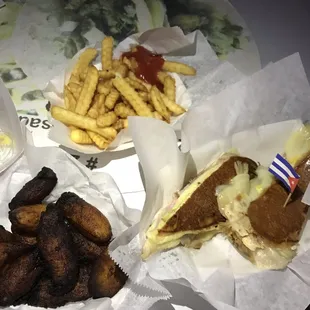 a sandwich, fries, and ketchup