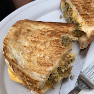 Sausage, egg, cheese panini, cooked perfectly. The first bite has a great crunch, portion is very generous. Yum!