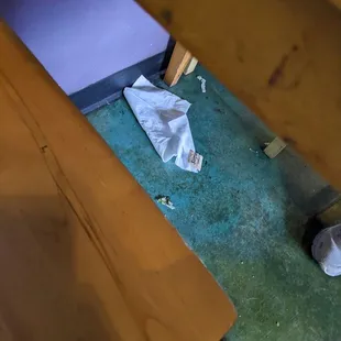 a pair of white shoes on the floor
