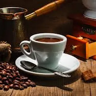 a cup of coffee and beans