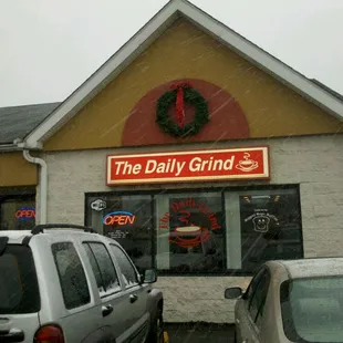 cars parked in front of a store