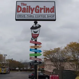 a sign for a coffee shop