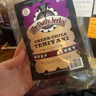a hand holding a bag of beef jerky jerky jerky jerky jerky jerky jerky jerk