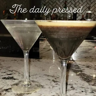 two martinis on a bar