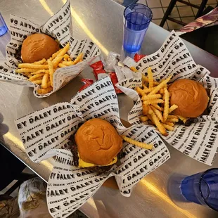 3 $8.5 reg Daley Burgers, 2 with fries. DELICIOUS!