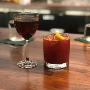 a glass of red wine and a glass of red wine