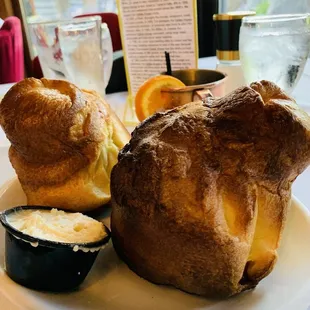 Piping hot poppers and honey cinnamon butter.