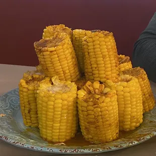 Corn on the cob added to bag