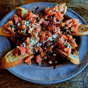 Bruchetta, perfectly toasted bread, cool crisp tomatoes. Great appetizer.