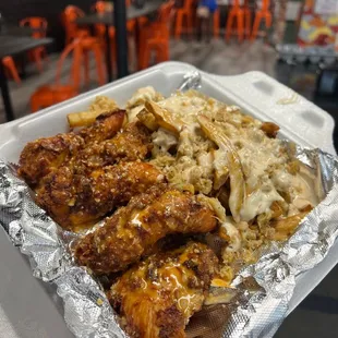 Hot garlic parm tenders and crab fries