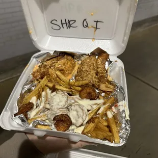 Lemon pepper tenders and queso and shrimp fries...I am their number one fan