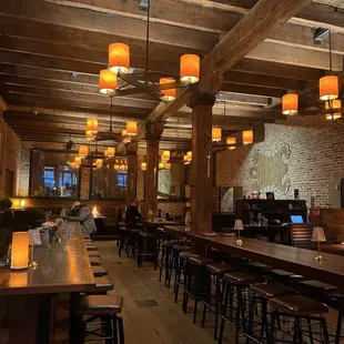 a restaurant with a long wooden table