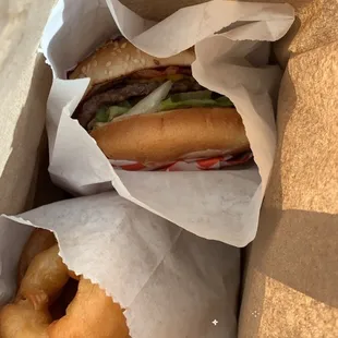 Onion rings and Deluxe Burger with bacon