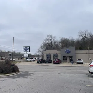 a parking lot with cars parked in it