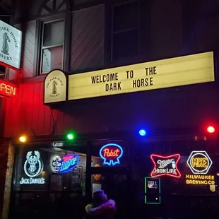 a neon sign for the tavern
