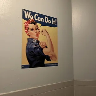 Artwork in women's bathroom