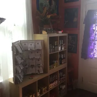 Ritual oils, spiritual perfumes, washes, and Drapo, special Vodou art imported from Haiti