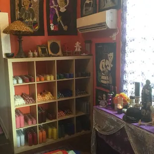 A beautiful range of candles and Drapo, special Vodou art from Haiti