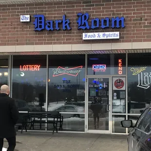 a man walking in front of the store