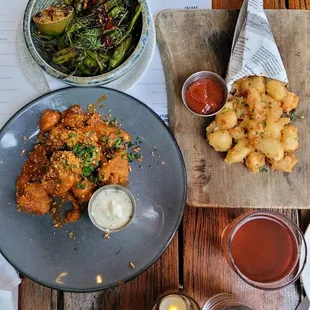 Buffalo cauliflower, cheese curds, shishito peppers