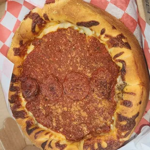 Sausage and pepperoni, uncut.