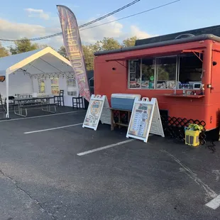 a food truck parked in a parking lot