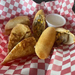 Southwest Chicken Eggrolls - crispy egg rolls w/ grilled chicken, pepper jack cheese, black beans, and sweet corn