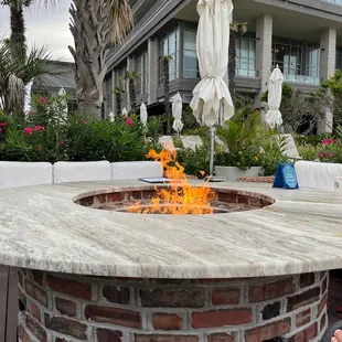 a fire pit in the foreground