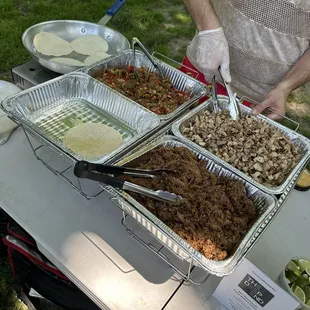 Carnitas, vegetable, and chicken tacos catered to the park !