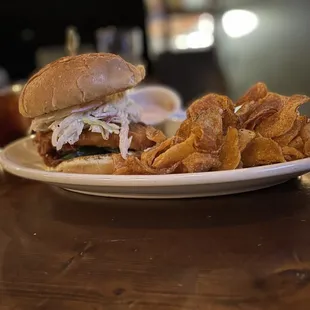 Chicken sandwich with house made potato chips.  Featuring a &quot;Not for nothing&quot; cocktail.