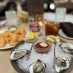Oysters on the half shell and fried Sassy Cow&apos; Cheese Curds