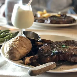 Bone-in ribeye steak, side of asparagus, brandy Alexander