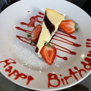 a piece of cake with strawberries on it