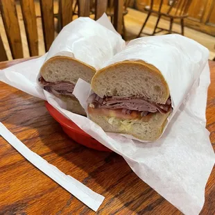 Italian sandwich with fries (in the back).